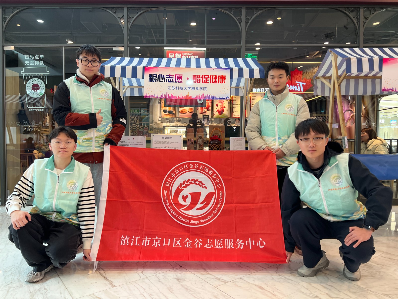 1741180549288119.jpg 图为志愿者合照.JPG